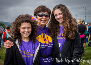 Janet volunteering with her granddaughters